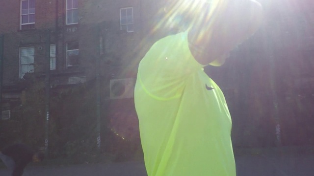 Video Reference N1: Green, Yellow, Light, Snapshot, Standing, Outerwear, Shoulder, Photography, Jacket, Sunlight
