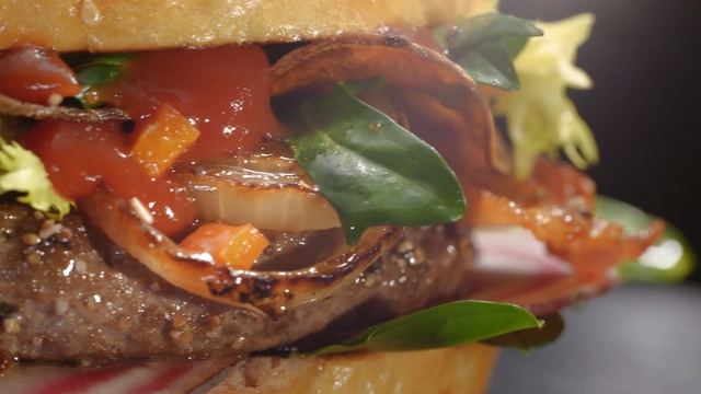 Video Reference N3: hamburger, dish, sandwich, breakfast sandwich, veggie burger, food, buffalo burger, pan bagnat, cheeseburger, blt