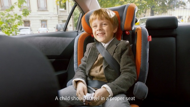Video Reference N1: car, family car, car seat, sitting, automotive design, vehicle, luxury vehicle, child, product, Person