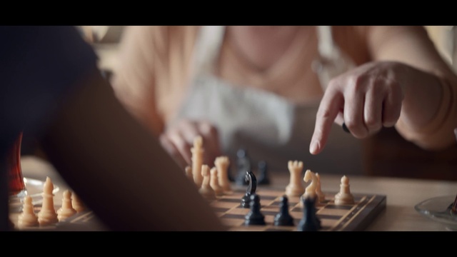 Video Reference N10: Hand, Sports equipment, Human body, Chess, Finger, Table, Board game, Sharing, Thumb, Chessboard