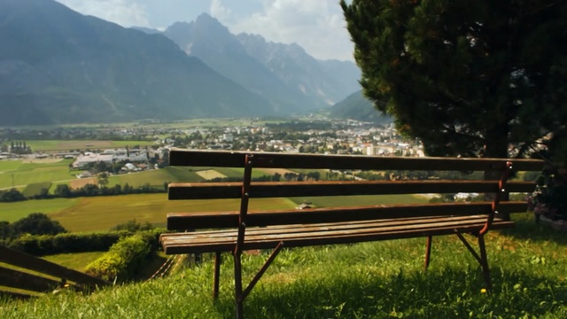 Video Reference N1: Bench, Natural landscape, Nature, Hill station, Nature reserve, Furniture, Outdoor bench, Rural area, Grassland, Meadow