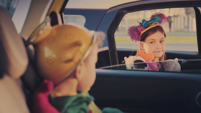 Video Reference N2: car, family car, child, girl, fun, toddler, product, car seat, Person