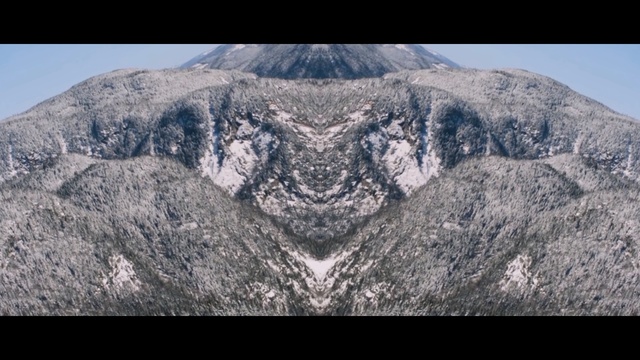 Video Reference N0: Mountainous landforms, Mountain, Mountain range, Rock, Geological phenomenon, Wilderness, Batholith, Geology, Symmetry, Massif