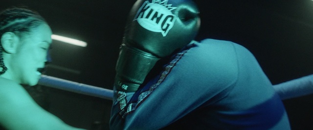 Video Reference N4: Boxing, Green, Sport venue, Boxing ring, Arm, Striking combat sports, Boxing glove, Font, Contact sport, Boxing equipment, Person