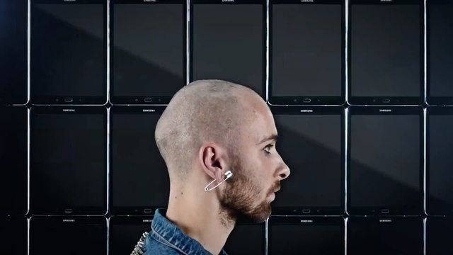 Video Reference N0: head, chin, facial hair, muscle, electronic device, technology, neck, audio, audio equipment