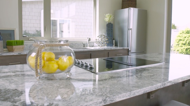 Video Reference N2: countertop, yellow, kitchen, table, interior design, glass, sink, tap, flooring, floor