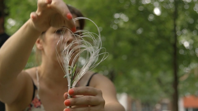 Video Reference N1: girl, hand, grass, tree, fun, water, arm, summer, plant, finger