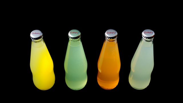 Video Reference N1: Yellow, Drink, Water, Soft drink, Bottle, Non-alcoholic beverage, Carbonated soft drinks, Glass bottle, Liquid