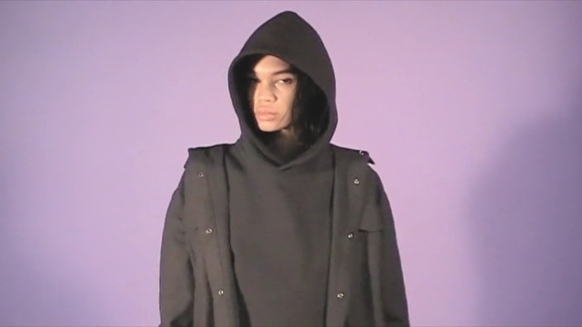 Video Reference N4: Clothing, Outerwear, Jacket, Sleeve, Coat, Headgear, Hood, Beanie, Hoodie, Overcoat