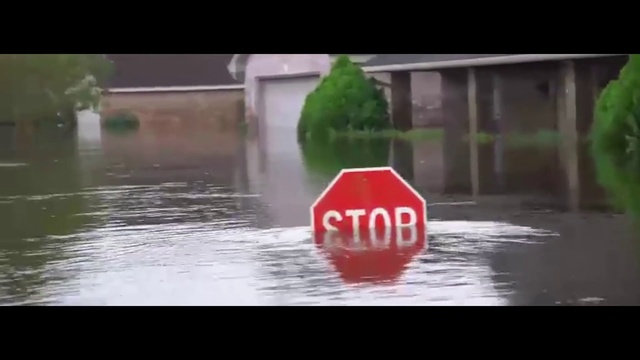 Video Reference N1: Flood, Water, Atmospheric phenomenon, Mode of transport, Reflection, Traffic sign, Event, Font, Signage, Geological phenomenon