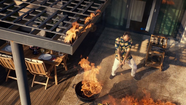 Video Reference N1: man, street, kitchen, bbq, fire, crazy, cook