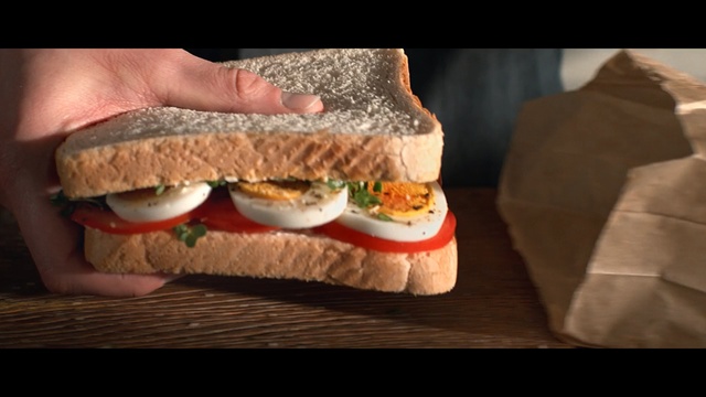 Video Reference N4: fast food, sandwich, junk food, finger food, food, hamburger, breakfast sandwich, veggie burger, whopper