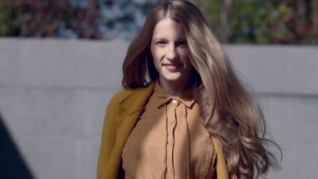Video Reference N1: Hair, Blond, Fashion, Fashion model, Street fashion, Long hair, Hairstyle, Beauty, Lip, Brown hair, Person, Clothing, Outdoor, Woman, Building, Wearing, Looking, Cellphone, Standing, Phone, Holding, Shirt, Young, Front, Dress, Using, Street, Talking, White, Table, Man, Yellow, Suit, Red, City, Human face, Jacket, Smile, Coat, Portrait, Girl, Fashion accessory, Scarf