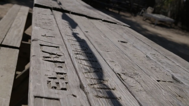 Video Reference N1: wood, line, floor, lumber, roof, angle, wood stain, Person