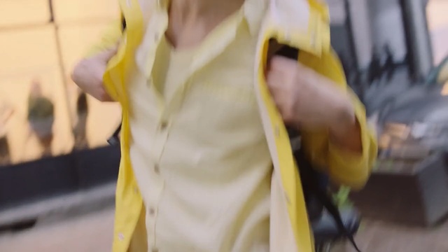 Video Reference N1: Yellow, Outerwear, Costume, Textile, Street fashion, Dress, Trench coat, Jacket