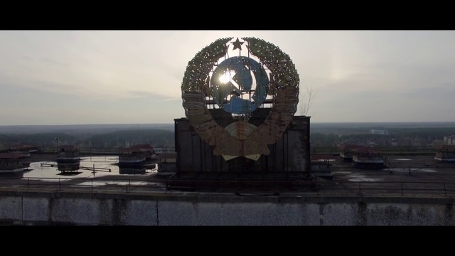 Video Reference N3: Landmark, Sky, Tower, Architecture, Historic site, Atmosphere, Clock tower, Photography, Monument, World, Clock, Sitting, Large, Photo, View, Light, Train, White, Table, Water, City, Man, Standing, Cloud, Screenshot, Skyscraper, Art