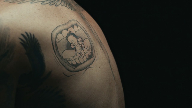 Video Reference N17: tattoo, arm, close up, hand, darkness, facial hair, tattoo artist, back, temporary tattoo