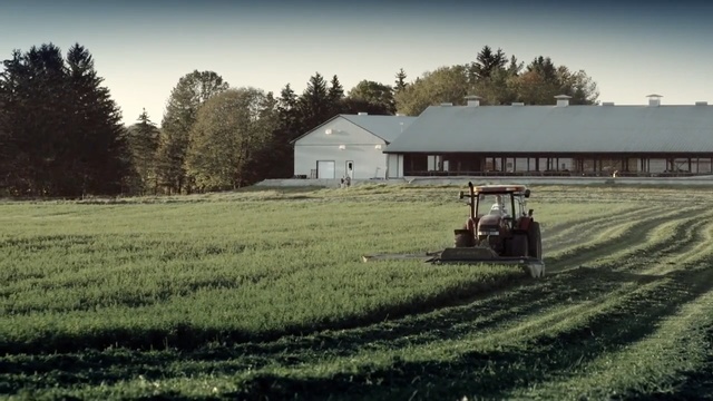 Video Reference N2: farm, field, grassland, agriculture, rural area, grass, pasture, prairie, house, farmhouse, Person