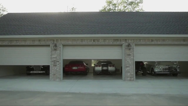 Video Reference N0: Property, Building, Vehicle, Luxury vehicle, Garage, Car, Real estate, Commercial building, Garage door, House