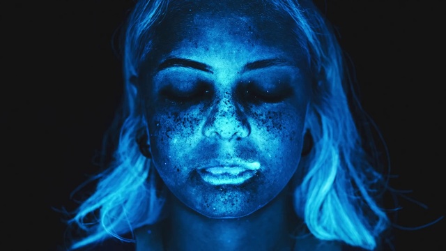 Video Reference N4: Face, Blue, Head, Electric blue, Human, Mouth, Jaw, Photography, Darkness, Colorfulness