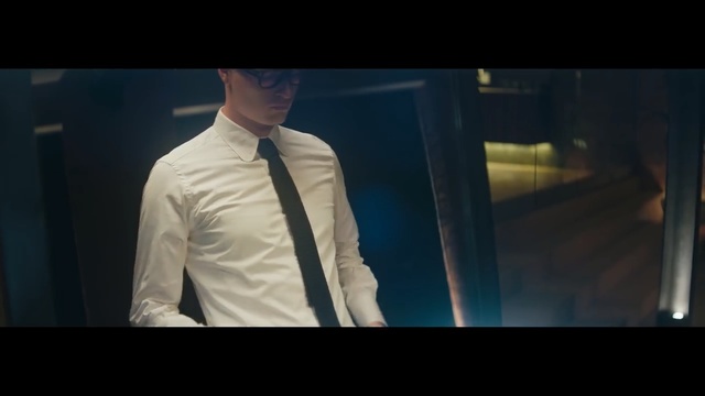 Video Reference N2: blue, man, gentleman, snapshot, screenshot, human, darkness, outerwear, suit, formal wear