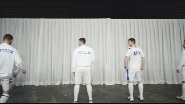 Video Reference N9: clothing, white, man, day, team, male, uniform, player, sports, outerwear