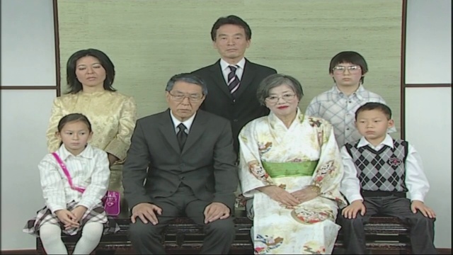 Video Reference N4: People, Social group, Event, Family, Formal wear, Sitting, Suit, Kimono, Smile, Child