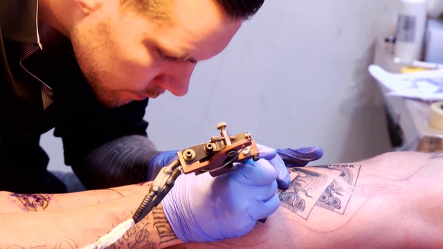 Video Reference N4: Tattoo, Arm, Joint, Design, Tattoo artist, Hand, Neck