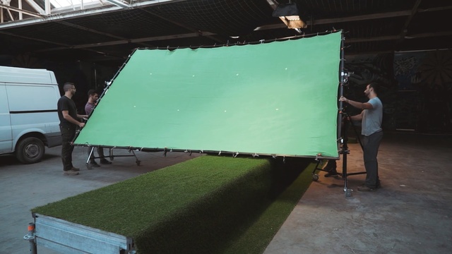 Video Reference N0: Green, Shade, Technology, Projection screen, Rectangle, Person