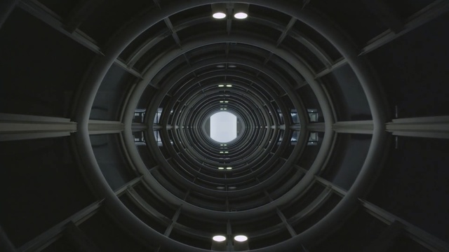 Video Reference N4: infrastructure, light, circle, black and white, daylighting, wheel, space, darkness, Person