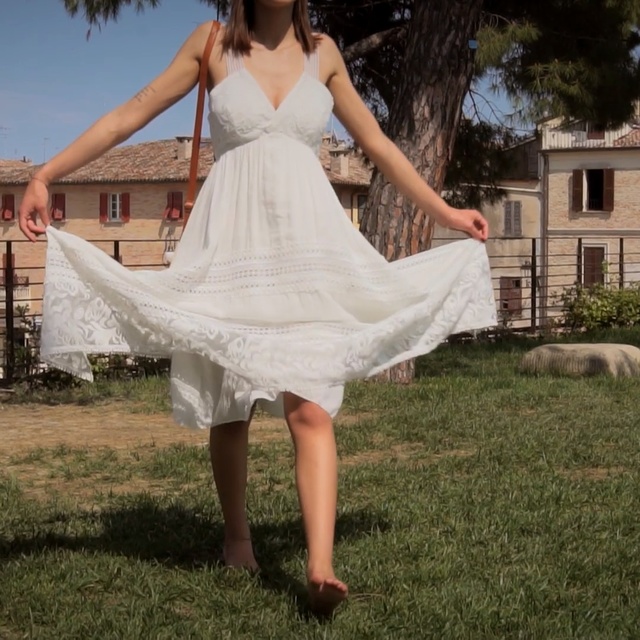 Video Reference N0: Wedding dress, Dress, Clothing, White, Photograph, Gown, Bridal clothing, Lady, Beauty, Bridal party dress, Outdoor, Grass, Person, Building, Woman, Young, Girl, Posing, Yard, Standing, Holding, Dressed, Large, Wedding, Man, Playing, Field, Elephant, Bride, Fashion