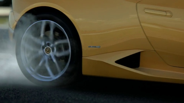 Video Reference N10: Land vehicle, Vehicle, Car, Automotive design, Wheel, Alloy wheel, Supercar, Sports car, Personal luxury car, Yellow