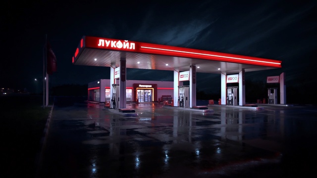 Video Reference N1: filling station, night, light, darkness, metropolitan area, neon, fuel, gasoline