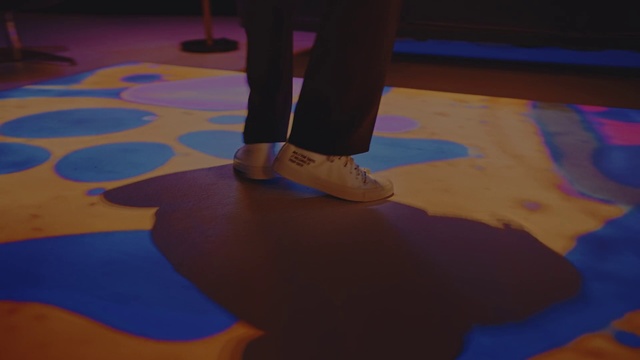 Video Reference N0: Leg, Floor, Foot, Flooring, Electric blue, Art, Human leg, Ankle, Shoe, Balance