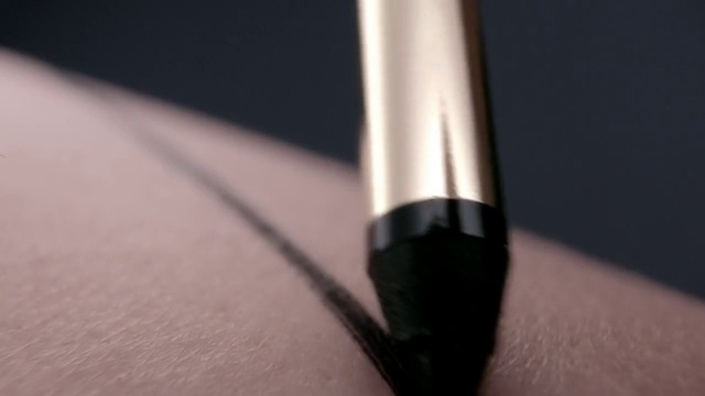 Video Reference N3: Pen, Eyebrow, Fountain pen, Finger, Close-up, Office supplies, Material property, Hand, Wedding ring, Ring