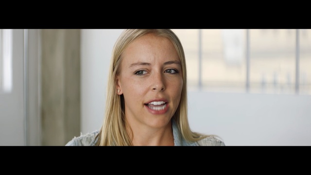 Video Reference N1: Face, Hair, Skin, Eyebrow, Cheek, Photograph, Nose, Facial expression, Blond, Chin, Person, Indoor, Woman, Photo, Window, Looking, Front, Holding, Posing, Smiling, Lady, Young, Sitting, Screen, Girl, Standing, White, Computer, Shirt, Laptop, Table, Room, Red, Man, Blue, Human face, Smile, Portrait, Screenshot, Lipstick, Lip, Eyelash, Layered hair, Brown hair