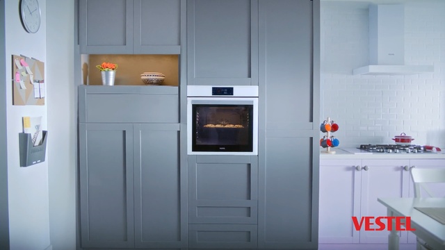 Video Reference N1: Major appliance, Room, Property, Home appliance, Kitchen appliance, Furniture, Oven, Door, Cabinetry, Material property, Person