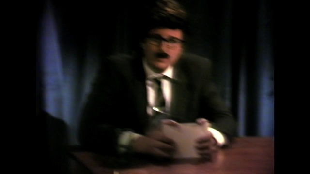 Video Reference N1: Photograph, Gentleman, Male, Suit, Darkness, Fun, Facial hair, Lady, Performance, Formal wear, Person