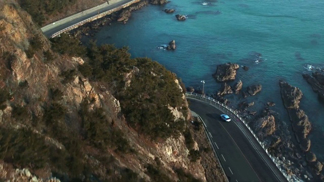 Video Reference N2: Coast, Aerial photography, Water, Coastal and oceanic landforms, Cliff, Cape, Sea, Infrastructure, Promontory, Bay