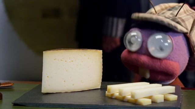 Video Reference N1: cheese, dairy product, gruyère cheese, food, montasio, pecorino romano, limburger cheese, ingredient, baking, Person