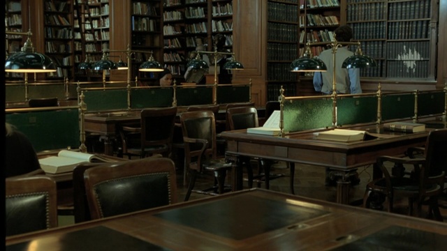 Video Reference N1: library, furniture, table, Person