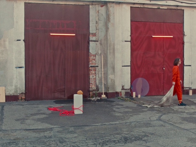 Video Reference N4: Red, Wall, Door, Line, Floor, Architecture, Flooring, Concrete, Road surface, Tints and shades