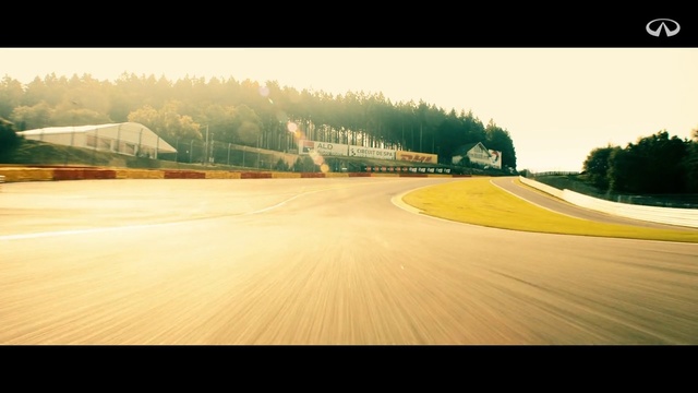 Video Reference N1: Sky, Yellow, Race track, Sport venue, Morning, Asphalt, Tree, Cloud, Atmosphere, Photography