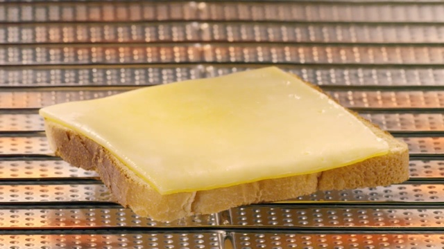 Video Reference N0: Food, Processed cheese, Gruyère cheese, Cheddar cheese, Cheese, Ingredient, Yellow, Dairy, Limburger cheese, American cheese