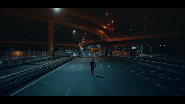 Video Reference N4: metropolitan area, night, atmosphere, infrastructure, lane, darkness, sky, light, urban area, architecture, Person