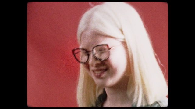 Video Reference N5: Hair, Face, Eyewear, Glasses, Facial expression, Cheek, Blond, Eyebrow, Nose, Head