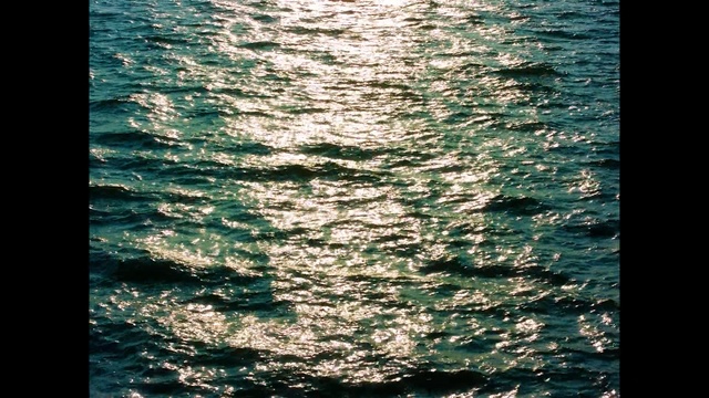 Video Reference N1: water, sea, wave, body of water, ocean, reflection, water resources, sunlight, calm, sky