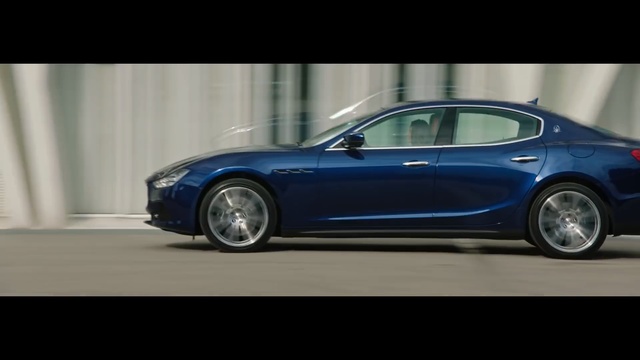 Video Reference N6: car, coupe, motor vehicle, automobile, auto, transportation, wheel, speed, vehicle, drive, fast, luxury, transport, headlight, motor, tire, self-propelled vehicle, sport, road, modern, style, expensive, power, sedan, design, sports, race, driving, wheeled vehicle, model, chrome, sports car, bumper, wheels, engine