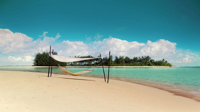 Video Reference N2: volleyball net, net, game equipment, beach, sand, equipment, sea, ocean, vacation, travel, water, island, coast, landscape, sky, shore, tropical, sport, holiday, summer, paradise, wave, tourism, Person