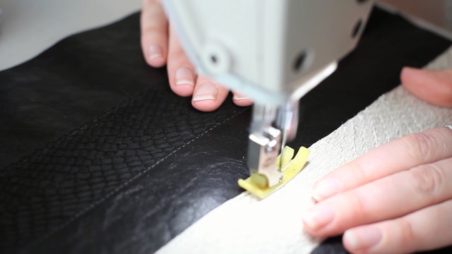 Video Reference N0: sewing, sewing machine, material, finger, nail
